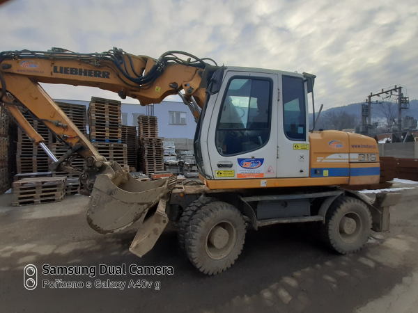 TM Stav, spol. s r.o. - Kolový nakladač Liebherr A316